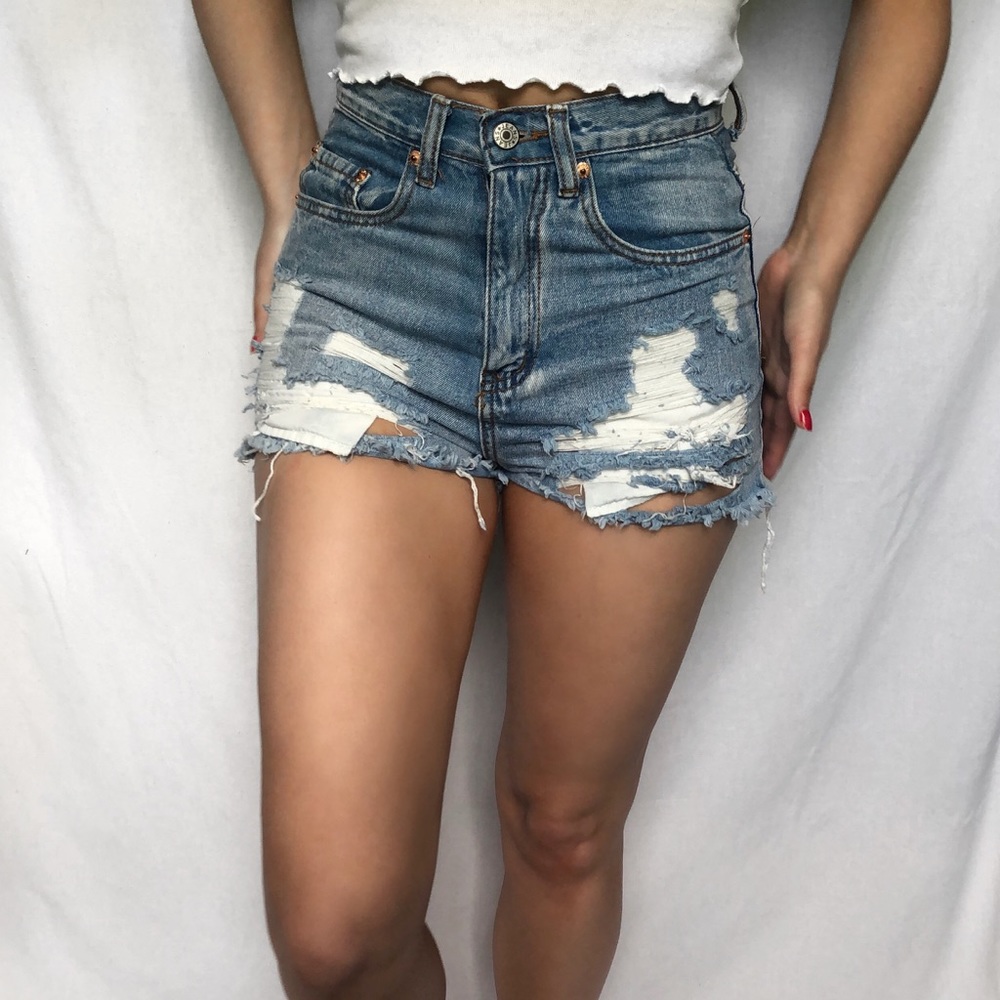 Distressed denim shorts